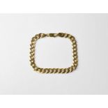 A 9ct gold flat curb bracelet with lobster claw clasp, approx. 14.6g.Length 21cm