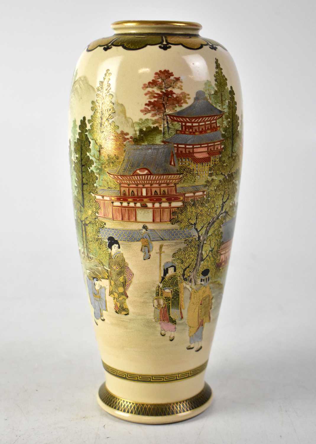 An early 20th century Satsuma slender baluster vase with hand-painted figural, pagoda and mountain