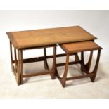 G-PLAN; an Astro teak nest of three tables.51 x 98 x 49cmThere are some deep scratches on the top,