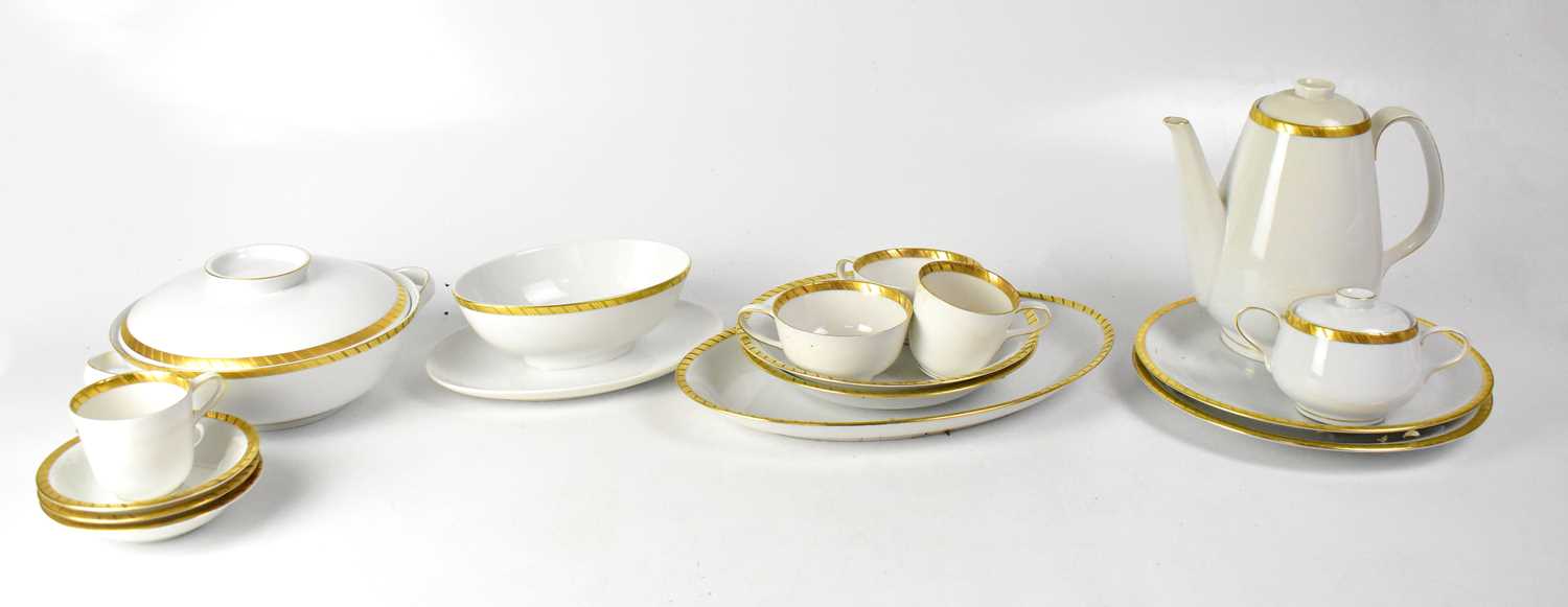 ROSENTHAL; an extensive white and gilt-heightened diner service including two lidded tureens, a