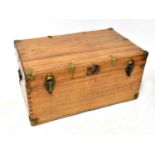 A vintage captain style pine travel trunk/chest with brass corners and straps and dovetail joints.43