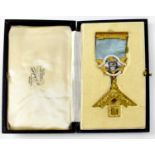 A 9ct gold Masonic jewel for the Silverwell Lodge No.5266, Bolton, with a white and coloured