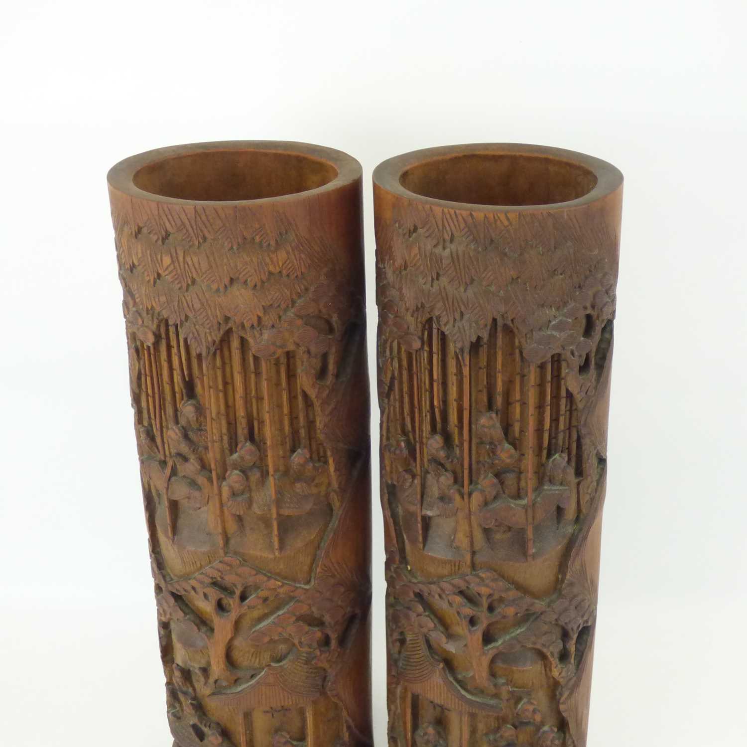 A pair of 20th century carved bamboo brush pots with carved figures in houses and within a bamboo - Image 3 of 3