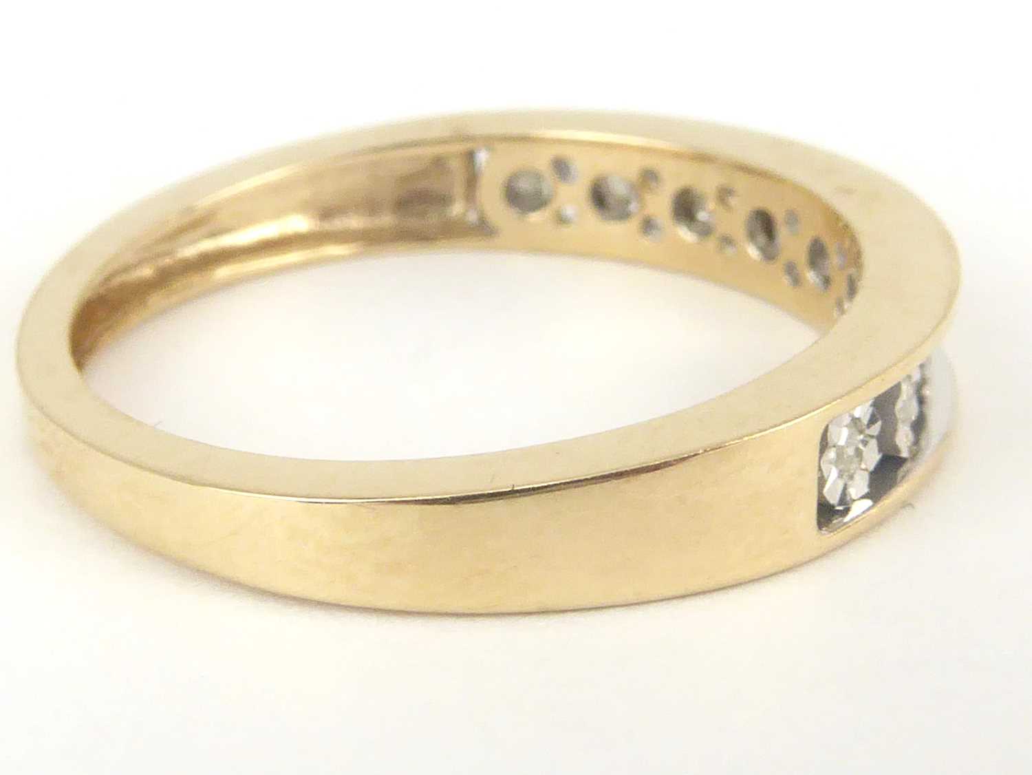 A 9ct gold half eternity ring with nine small channel set diamonds, total approx. 0.05ct, size M, - Image 2 of 2