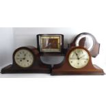 Four mantel clocks to include three oak cased examples comprising a Napoleon hat shape example, with