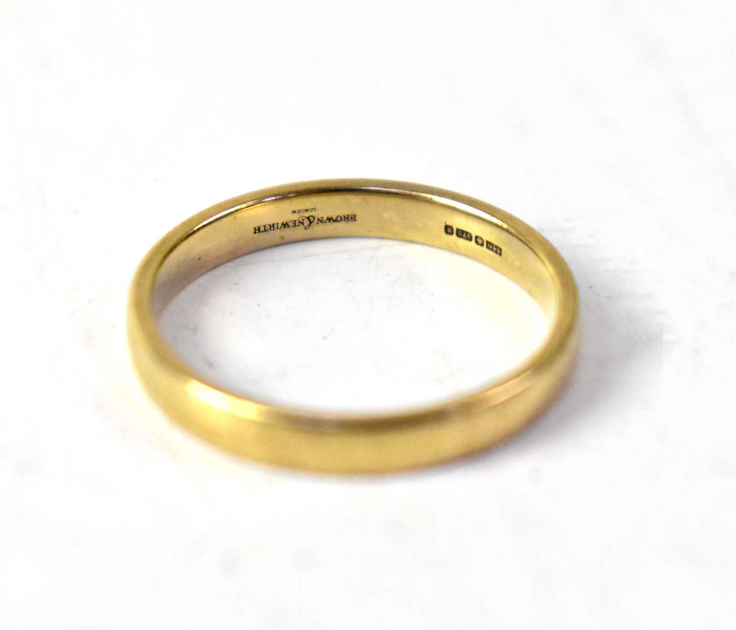 A 9ct yellow gold wedding band, size N, approx. 2.1g.