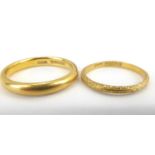 Two 22ct gold band rings, sizes N and K, combined approx. 6g.Qty: 2