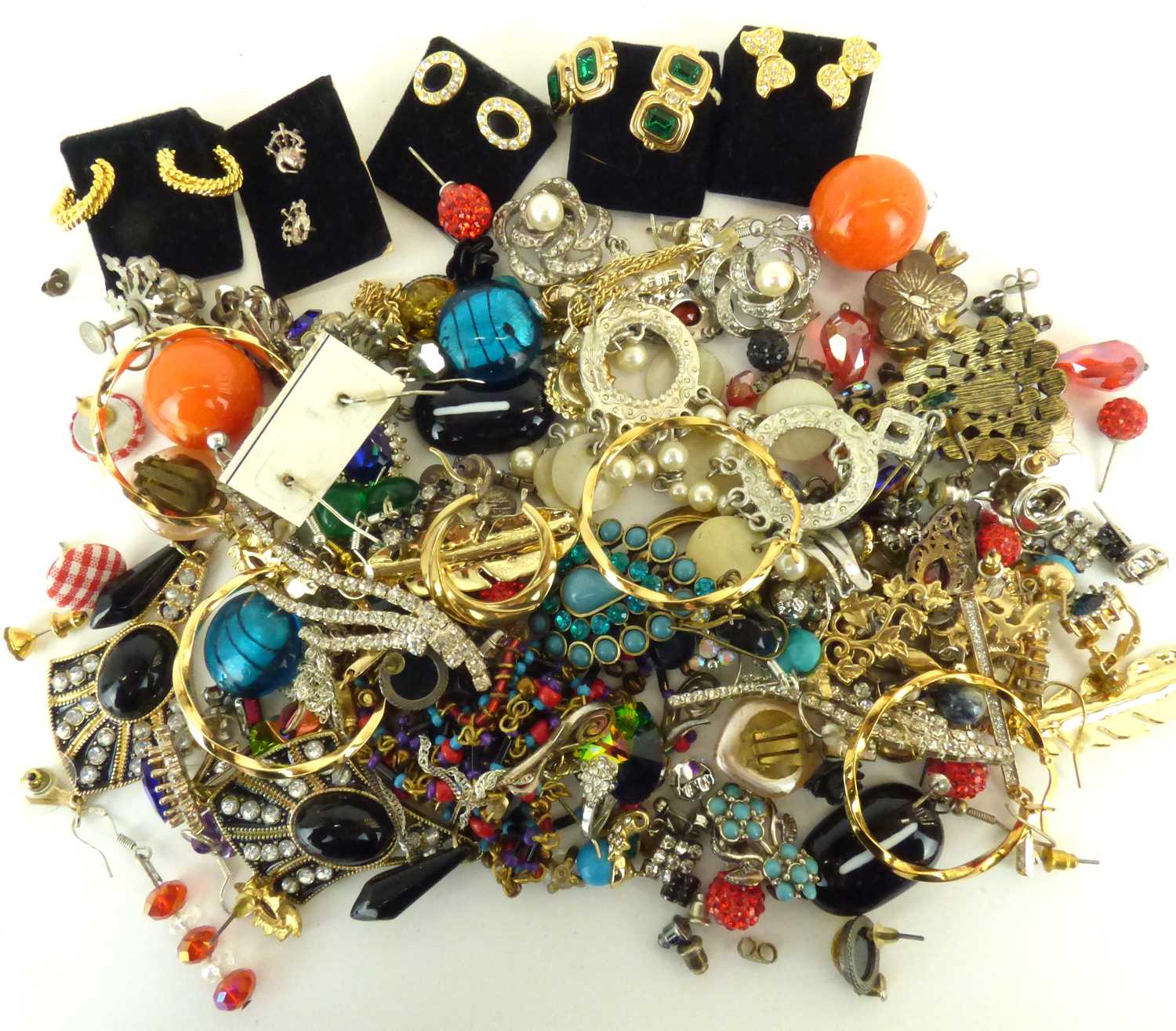 A quantity of modern and vintage earrings.