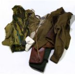 A National Service jacket with label for Edgard & Sons dated 1955, size 13, with a camouflage