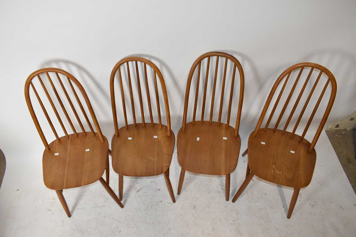 A 1970s light oak dining suite comprising drop-leaf dining table on block legs, four spindle arch - Image 8 of 8