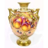 JOHN FREEMAN FOR ROYAL WORCESTER; a large and impressive twin handled hand painted pedestal vase,