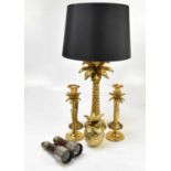 A pair of modern gilt brass candlesticks modelled as pineapples trees, height 29cm, with a further