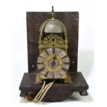 HENRICUS MONTLON LONDINI; a 17th century and later brass lantern clock, with engraved Roman