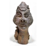 An unusual stoneware bust of double sided abstract head, height 49cm.