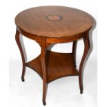 An Edwardian two tier inlaid mahogany occasional table, the circular top with inlaid shell, height