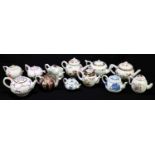 VICTORIA AND ALBERT MUSEUM; a collection of twelve porcelain teapots and covers after originals from