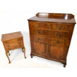 An early 20th century walnut bowfronted chest of three drawers above two panelled cupboard doors, on