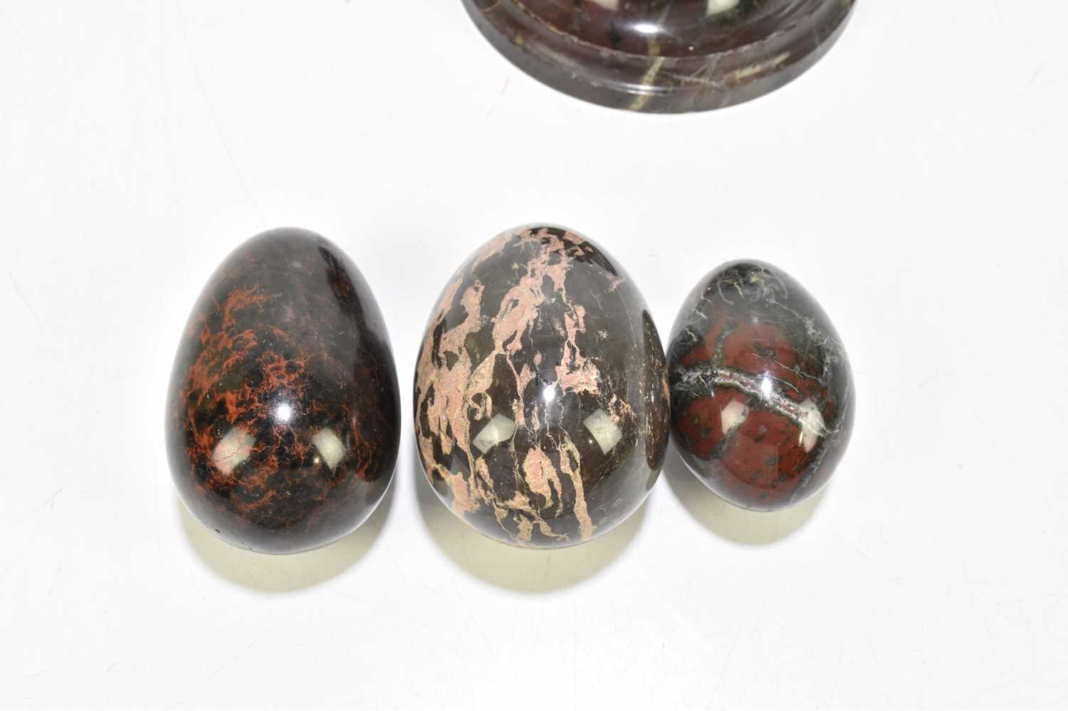 Three Cornish serpentine eggs, together with a serpentine match holder (4). - Image 2 of 2