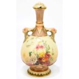 ROYAL WORCESTER; a blush ivory floral decorated twin handled vase and cover with green printed