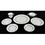 PARAGON; an Art Deco-style bone china dinner service, together with floral decoration.