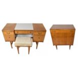 WRIGHTON FURNITURE; a 1970s two piece bedroom suite comprising mirror back knee-hole dressing table,