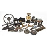 A mixed collection of metalware to include miniature irons, figures and a door lock, etc.