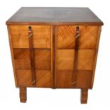 An Art Deco walnut chest with six short drawers, on serpentine legs, height 74cm, width 65cm,
