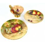 E. TOWNSEND FOR ROYAL WORCESTER; a hand painted cup and saucer, decorated with fruit, signed,