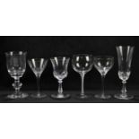 BACCARAT; nine champagne glasses with a Baccarat decanter and stopper, with two unmarked ewers, a