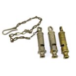 Three vintage police whistles, to include the Metropolitan patent, the Acme City whistle and the