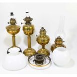 Assorted lighting to include three brass oil lamps, two with shades, each converted to