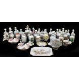 A collection of mixed ceramics to include pin dishes, crested ware, a ring tree, ceramic bottles,