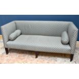 An Edwardian sofa, with patterned green upholstery, on tapered square legs, height 89cm, width