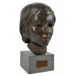 IAN HANSON; a bronze bust of Oliver, on square circular base, titled, signed and dated to 1974,