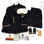 A 1950s Merchant Navy uniform originally belonging to John Brian Hargreaves, with cap, epaulettes