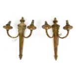 A pair of brass twin branch wall lights of neo-classical design, length 39cm, (2).Provenance: From