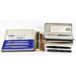 PARKER; a 61 fountain pen, boxed, together with three further fountain pens to include two Parker