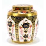 ROYAL CROWN DERBY; a ginger jar and cover in the Old Imari pattern, number 1128, height 11cm.