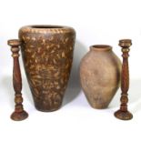A pair of Indian painted, turned and spiral fluted candle sticks with brass decoration, 51cm,