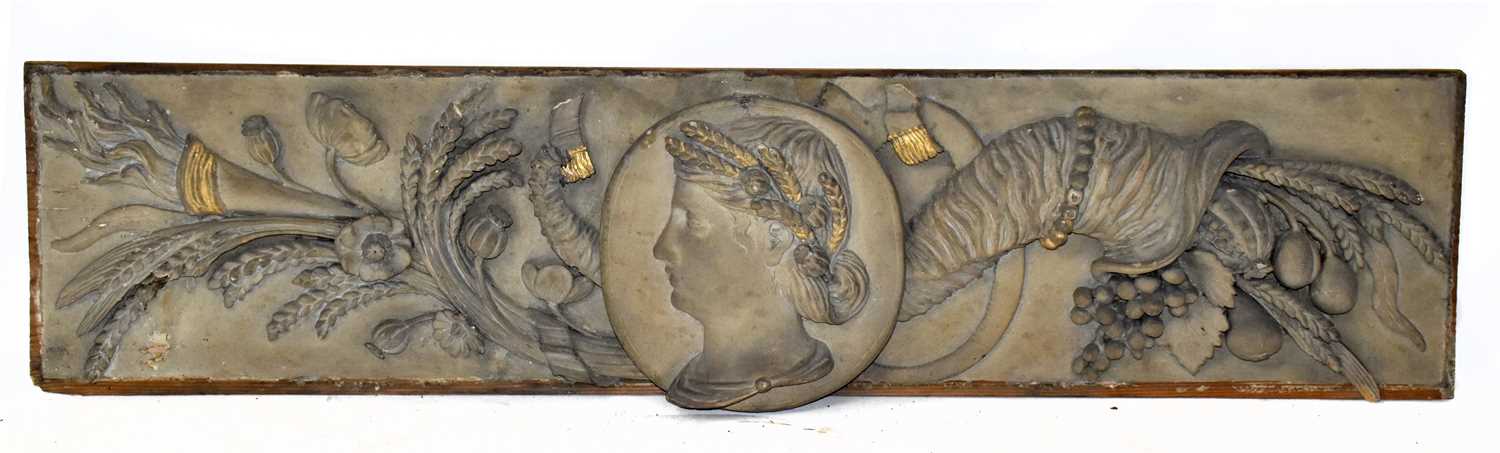 An early 19th century carved frieze representing Demeter Goddess of Harvest, 30 x 127cm.