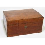 A 19th century figured wood sewing box, with domed top enclosing a compartmented interior, height