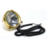 C.M. HALL LAMP CO, DETROIT, MICH, USA; a polished brass gimballed head lamp, with ribbed glass