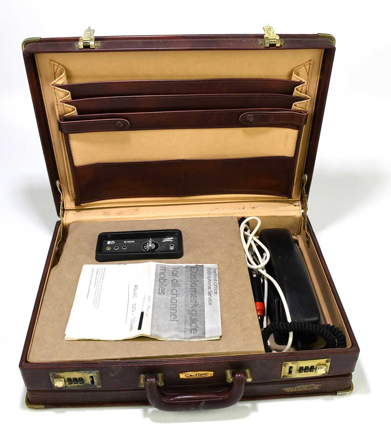 An unusual Carlton International briefcase enclosing an integral Pye telephone.