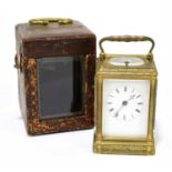 A 19th century French brass cased repeating carriage clock, the enamelled dial set with Roman