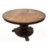 A William IV mahogany breakfast table, with circular top on octagonal column and circular platform