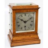 A 19th century oak cased four glass bracket clock, the silvered dial set with Roman numerals and