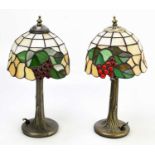 A pair of modern table lamps with Tiffany style leaded glazed shades, height 38cm (2).