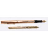 A 9ct yellow gold cased vintage fountain pen with Phillips 14ct nib and screw off cap, length 13.