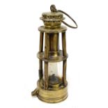 ASHWORTH PATENT; a Hepplewhite grey Stanley of Derby brass miner's lamp of conical form, height