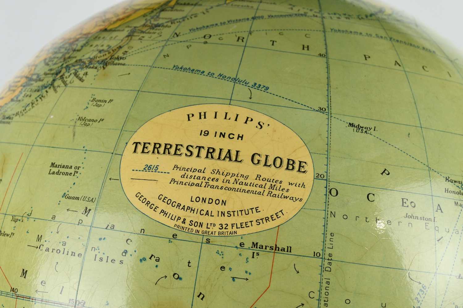 PHILLIPS; a 19” terrestrial globe on a wooden stand, height approx 64cm. - Image 2 of 2